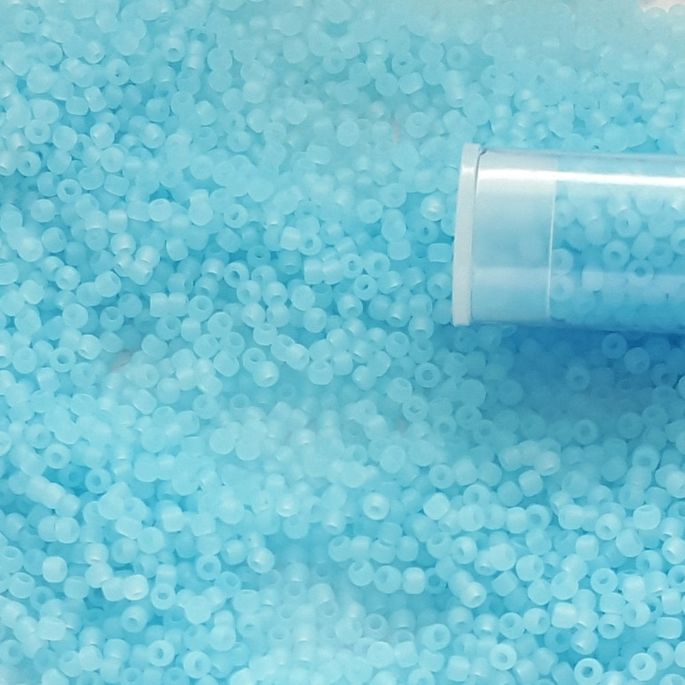 11/0 TR-143F Aqua Matte Ceylon Round Toho Seed Beads close up.