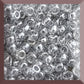 black diamond transparent luster round Toho seed beads. 11/0 in a square window.
