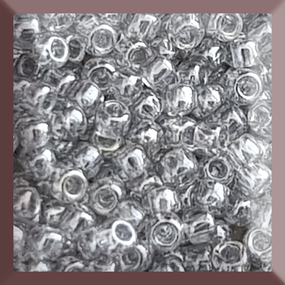 black diamond transparent luster round Toho seed beads. 11/0 in a square window.
