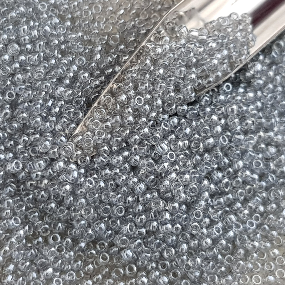 black diamond transparent luster round Toho seed beads. 11/0 with a beading scoop,

