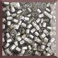 
A collection of black diamond silver lined matte Toho round seed beads. 11/0 in a square window.