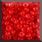 11/0 Toho Seed beads in cherry red opaque in a square window,