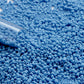 11/0 TR-43DF Cornflower Blue Opaque Matte Round Toho Seed Beads close up.