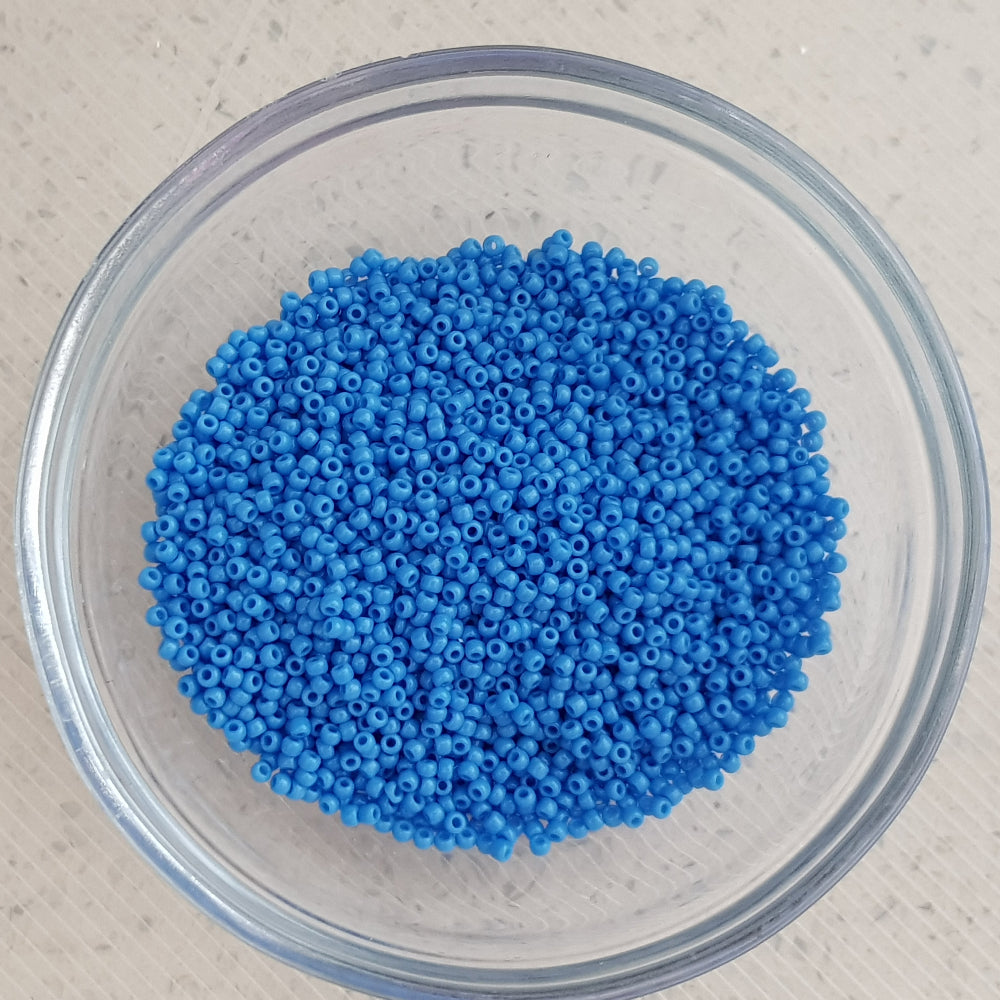 in a bowl 11/0 Toho Seed Beads in cornflower blue tr-43d