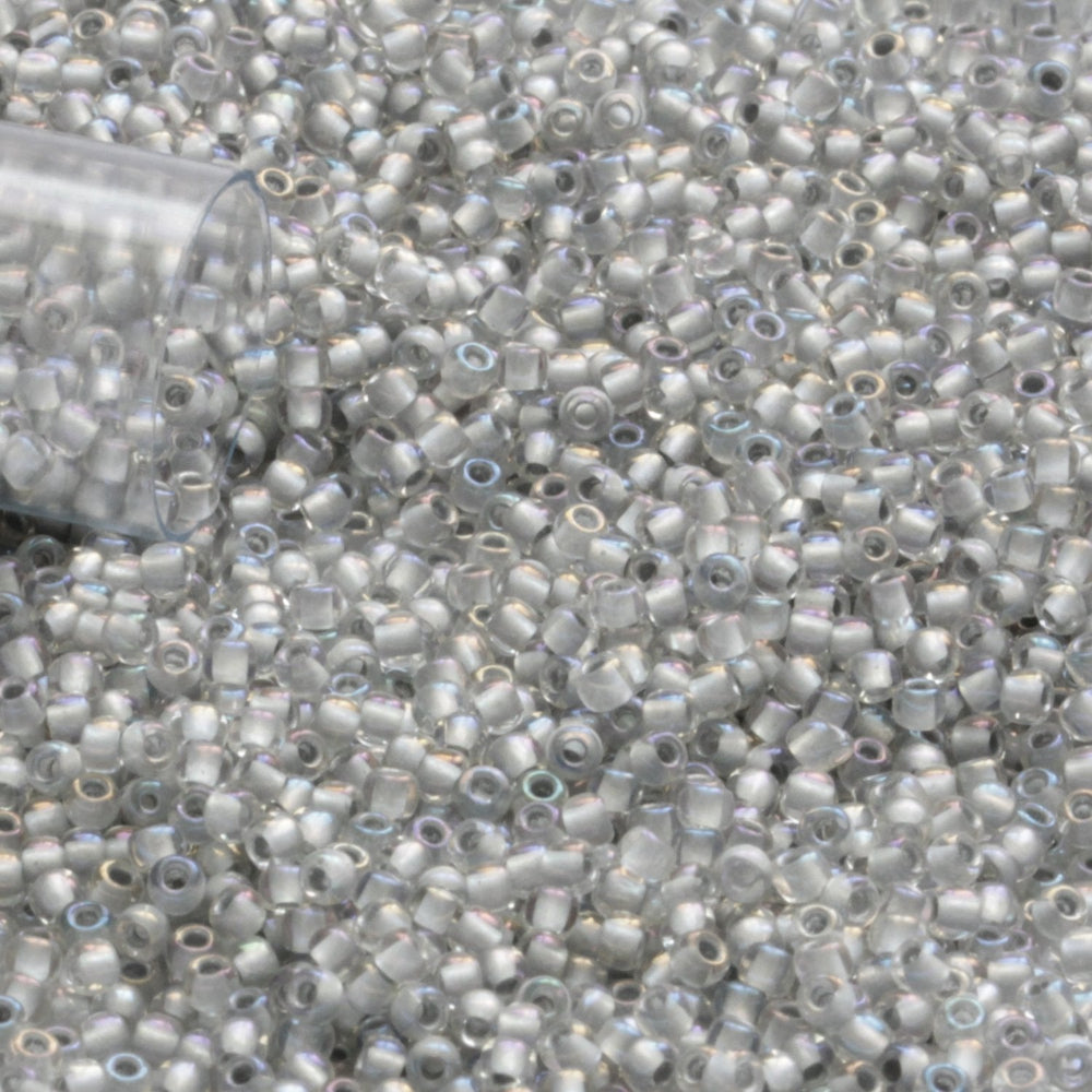 11/0 TR-261 Crystal Rainbow Grey Lined Round Toho Seed Beads close up.