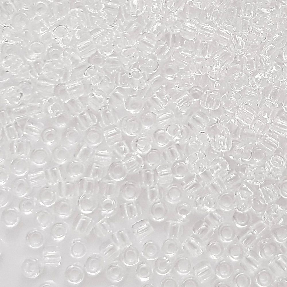 Toho 11/0  round, transparent, crystal-colored TR-1 Close up.
