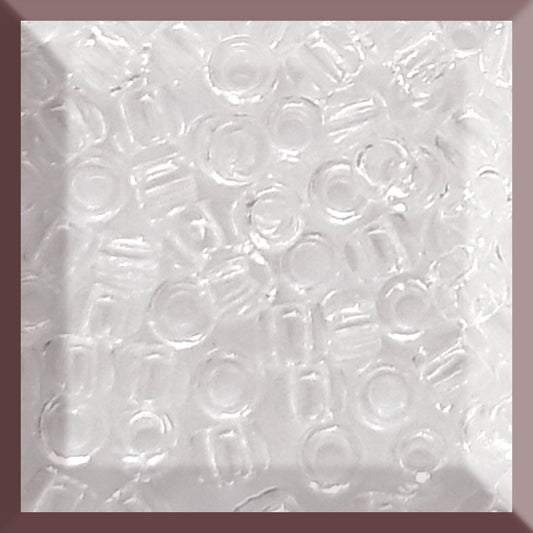 A close-up of transparent, round, crystal seed beads in a square window TR-1 11/0.