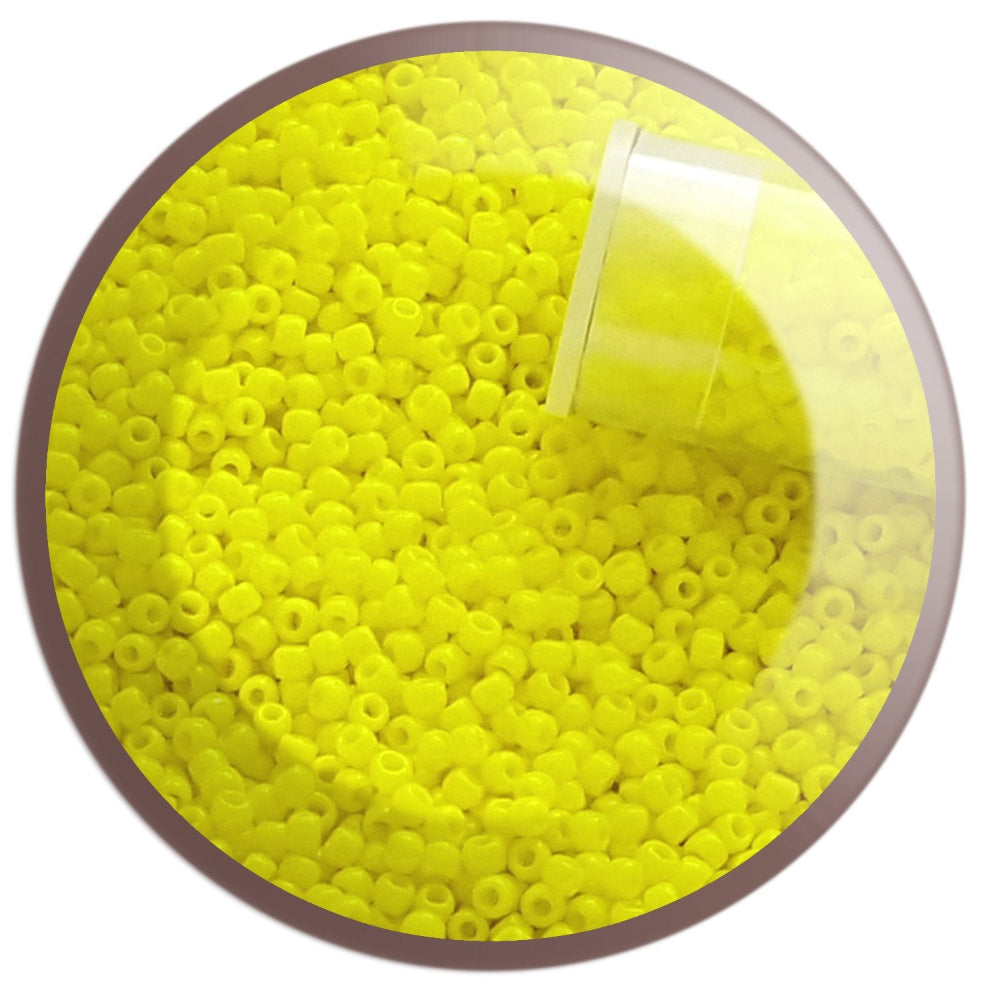 11/0 TR-42 Dandelion Yellow Opaque Round Toho Seed Beads in a circle white background,
