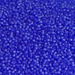 A close-up view of dark sapphire frosted transparent round Toho seed beads 11/0