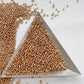 11/0 Toho Seed Beads in Golden Fleece Permanent Finish TR-PF592 with a triangle scoop.