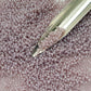 Toho seed beads in Grape Mist Ceylon colour 11/0 with a beading scoop,