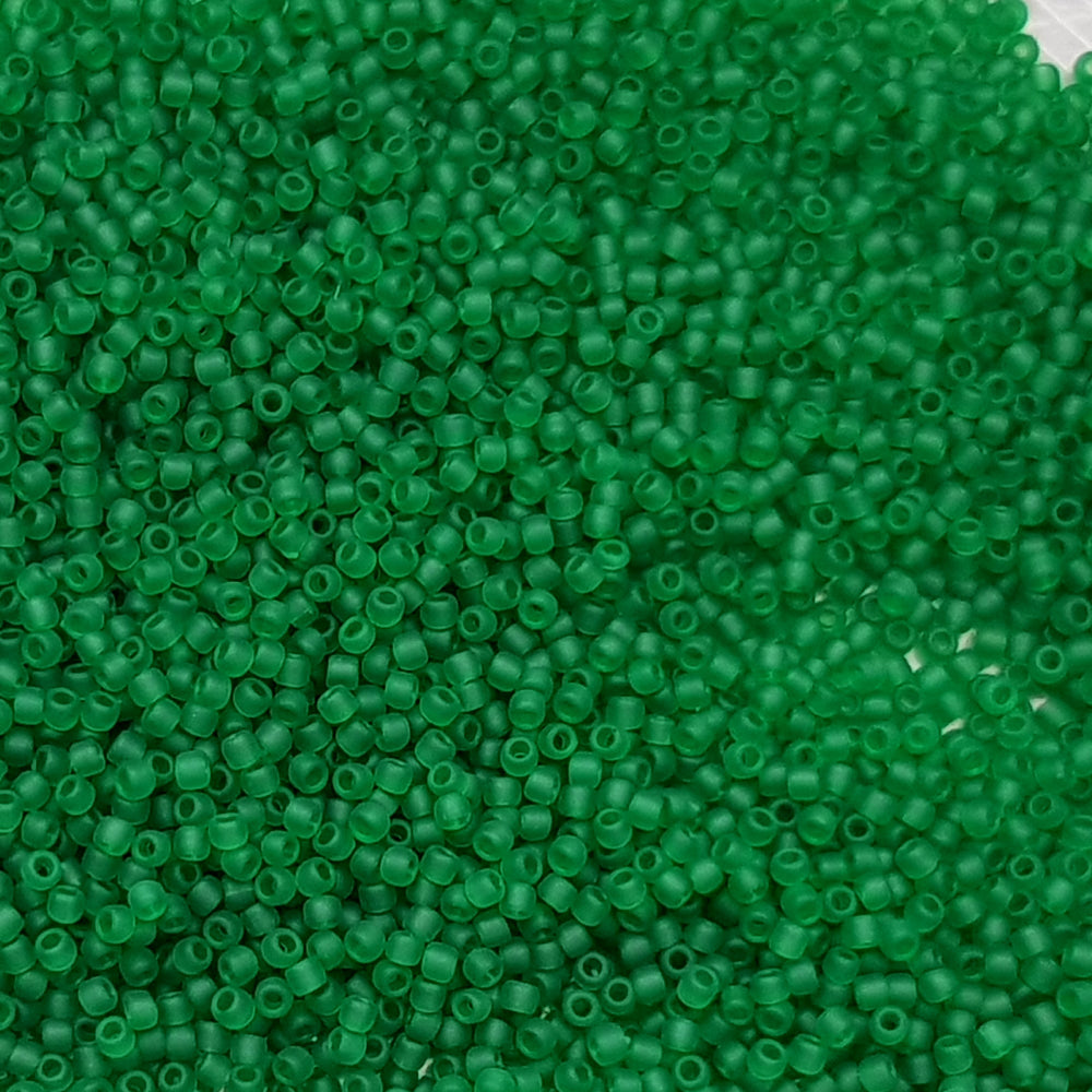11/0 Toho Seed Beads in grass green frosted transparent TR-7BF close up.