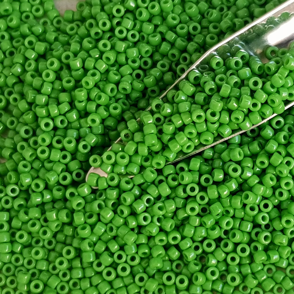 11/0 Toho seed beads in green mint opaque TR-47 with a beading scoop.