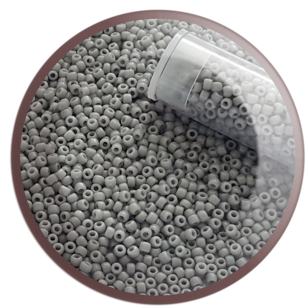 11/0 TR-53 Grey Opaque Round Toho Seed Beads TR-53 in a circle with white background.