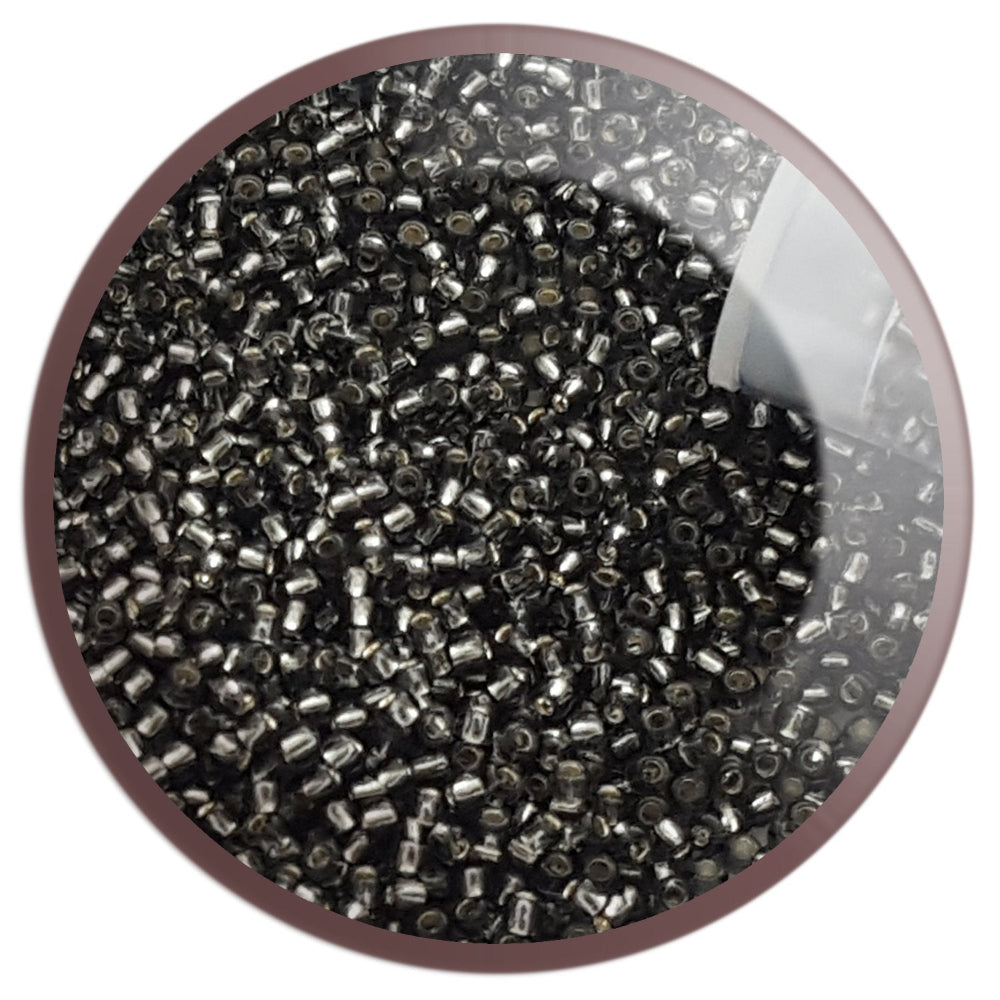 11/0 TR-29B Grey Silver Lined Round Toho circle with white background