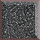 11/0 Toho Seed Beads in grey transparent in a square window.