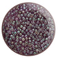 A close-up view of Hydrangea Gold Luster Round Toho Seed Beads 11/0 showing their lustrous finish and multicolored appearance. White background.