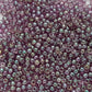 A close-up view of Hydrangea Gold Luster Round Toho Seed Beads 11/0 showing their lustrous finish and multicolored appearance. Close up.
