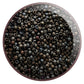 11/0 Toho Seed Beads in Iris Brown Metallic Frosted TR-83F in a circle white background.