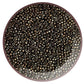 11/0 Toho Seed Beads in Iris Brown Metallic TR-83 in a circle white background