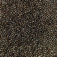 11/0 Toho seed Beads in Iris Brown Metallic TR-83 close up