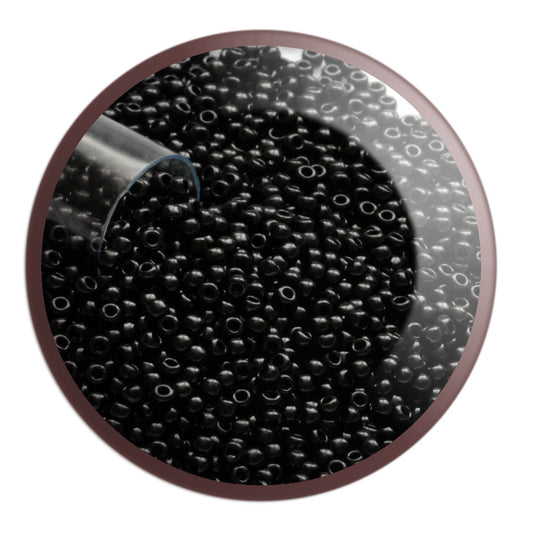11/0 TR-49  Jet Black Opaque Round Toho - Beading Supply - in a circle with white background.