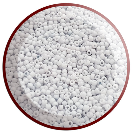 A close-up view of light grey frosted opaque pastel round Toho seed beads. 11/0 Toho Seed Beads,