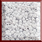 A close-up view of light grey frosted opaque pastel round Toho seed beads. 11/0 Toho Seed Beads, square window.
