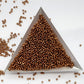 11/0 Toho Seed Beads in medal bronze galvanized permanent finish with triangle scoop.