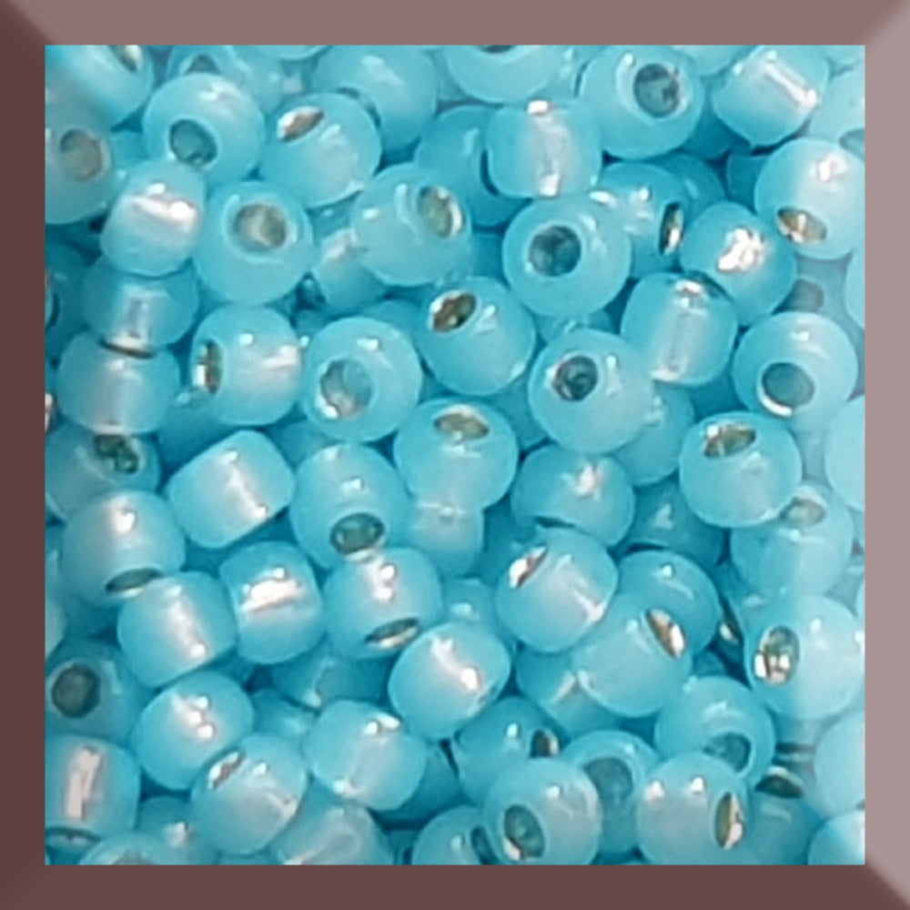 11/0 Toho seed beads in milky aqua silver-lined square window.