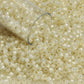 11/0 TR-2125 Milky Jonquil Ceylon Silver Lined Round Toho Seed Beads close 
