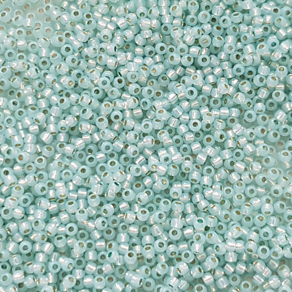 11/0 Milky Lt Aqua Silver-Lined Toho seed beads close up