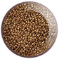 11/0 TR-204 Montana Blue Gold Luster Round Toho Seed Beads  in a circle white background.
