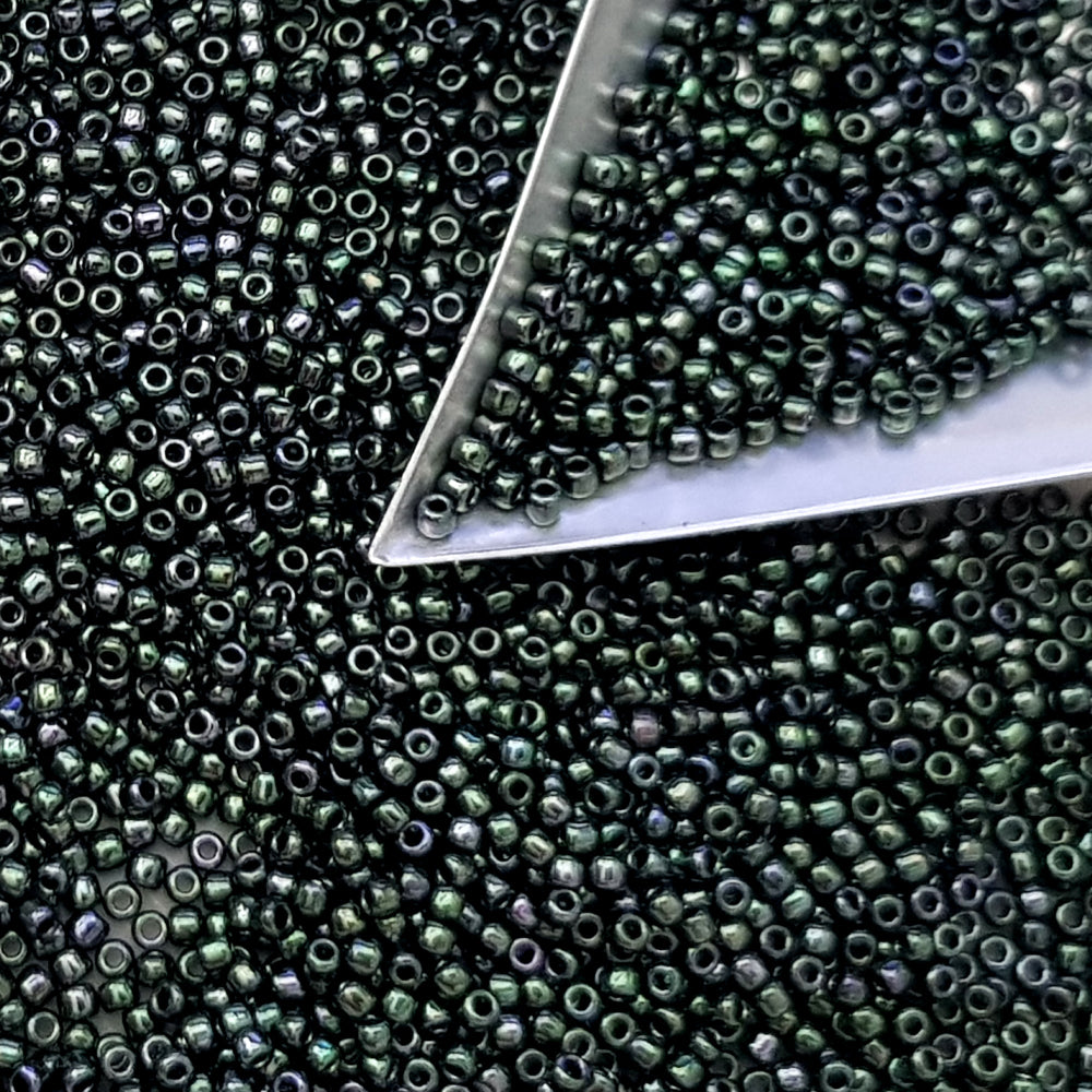 11/0 Toho seed beads in moss metallic TR-89 with a triangle scoop.