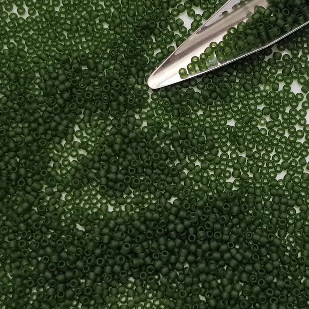 11/0 Toho Seed beads in olivine frosted transparent TR-940F with a beading scoop.