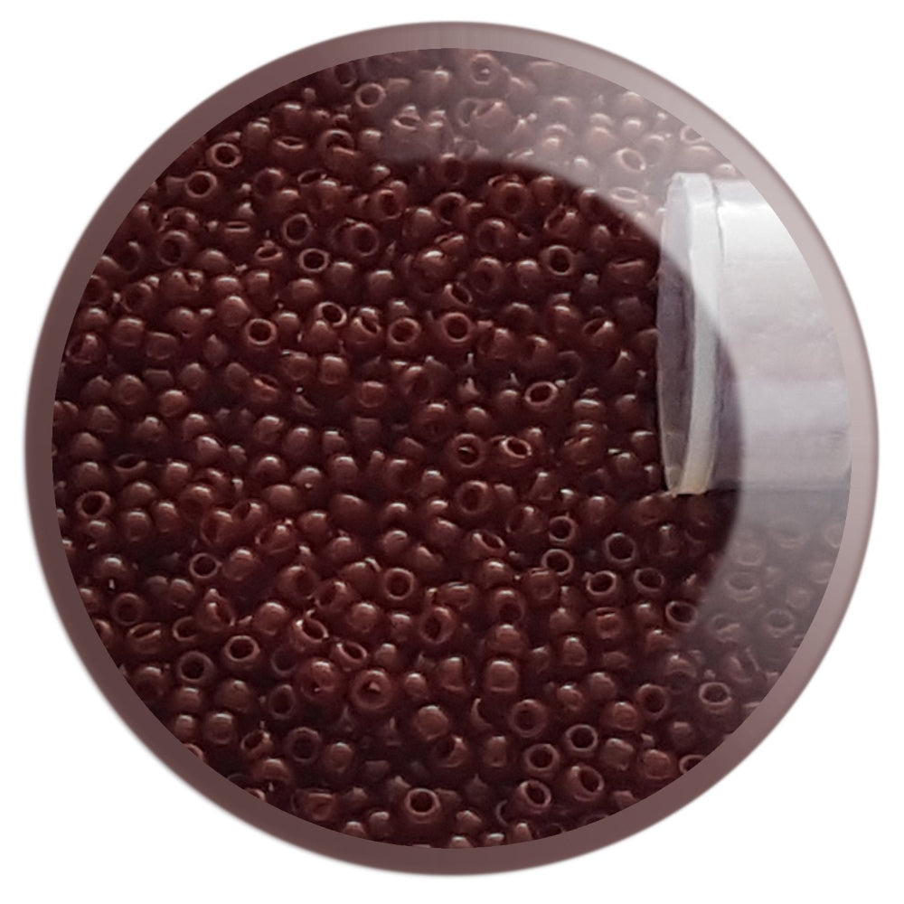 11/0 TR-46 Oxblood Opaque Round Toho Seed Beads tr-46 in a circle 