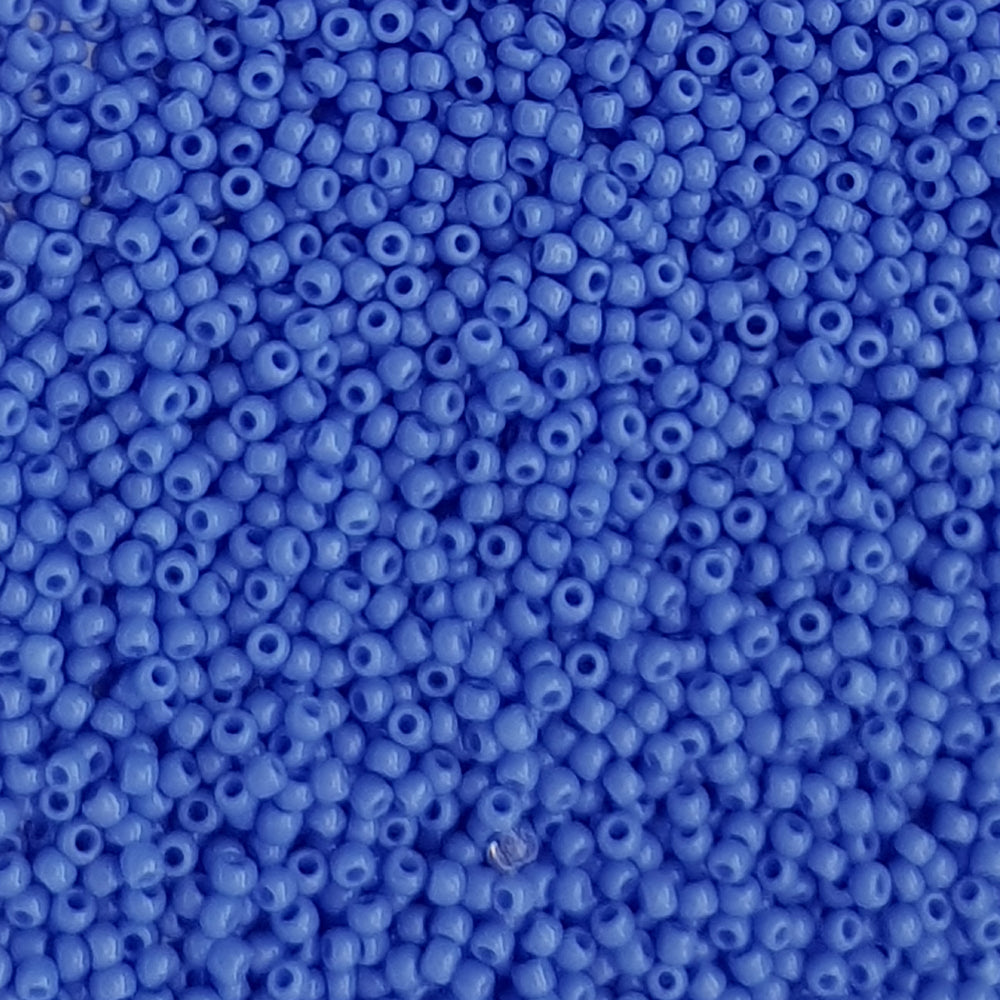 11/0 Toho seed beads in periwinkle blue opaque close up.