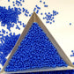 11/0 Toho seed beads in periwinkle blue opaque with a triangle scoop.