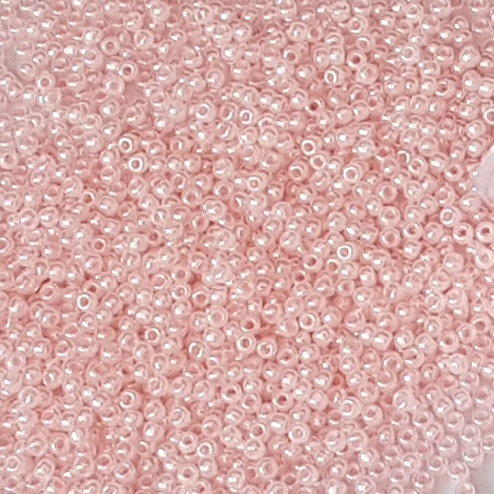 11/0 TR-145 Pink Innocent Ceylon Round Toho Seed Beads close up