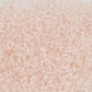 Pale pink transparent glass beads - Toho Seed Beads Rosaline Frosted 11/0 close up.
