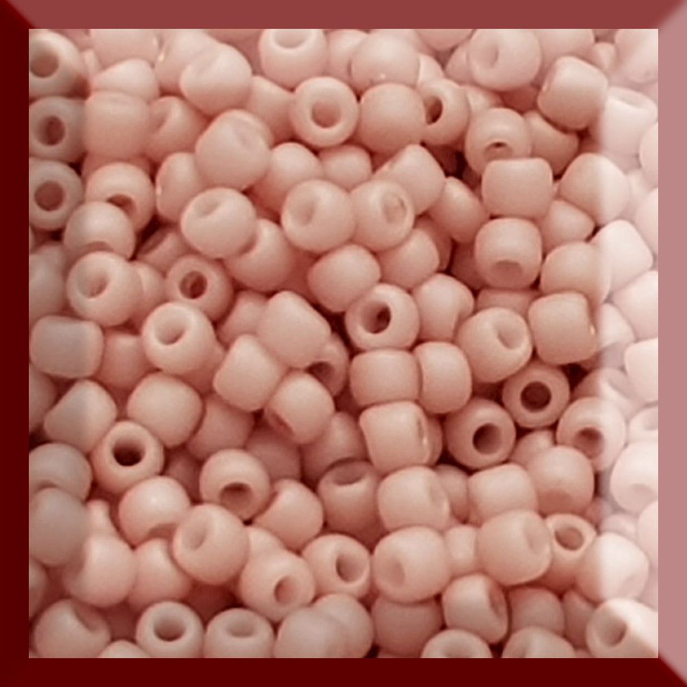 Close shrimp Frosted Opaque Pastel 11/0  Toho beads in a square window.