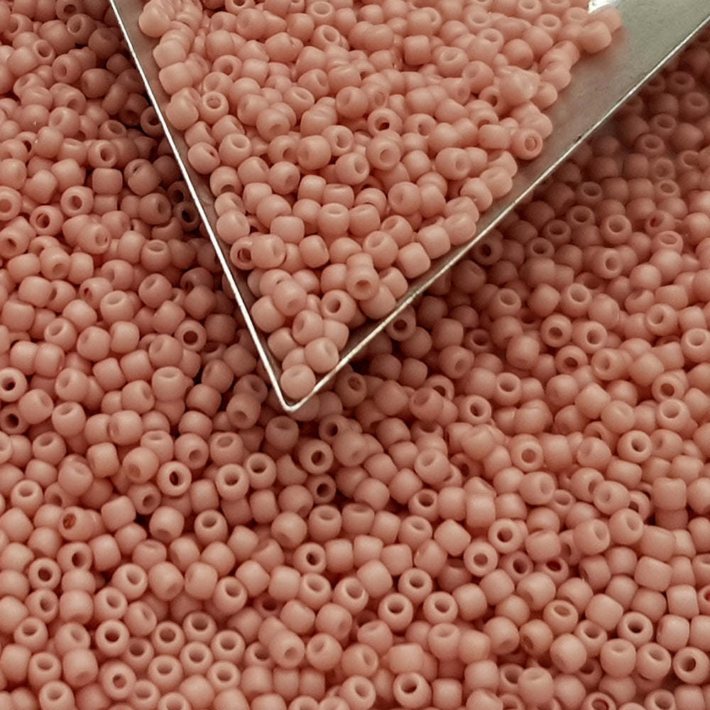 11/0 Toho seed beads in shrimp frosted opaque pastel with a triangle scoop.
