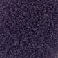 11/0 Toho seed beads in sugar plum frosted transparent in a close up.