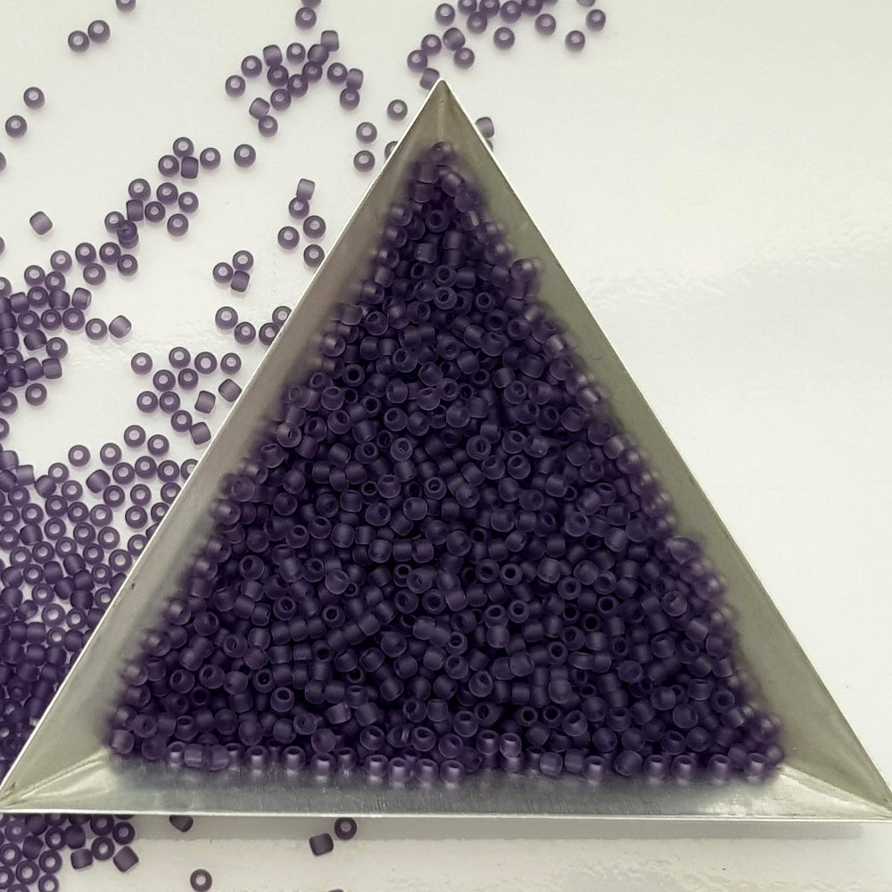11/0 Toho seed beads in sugar plum frosted transparent with a triangle scoop.