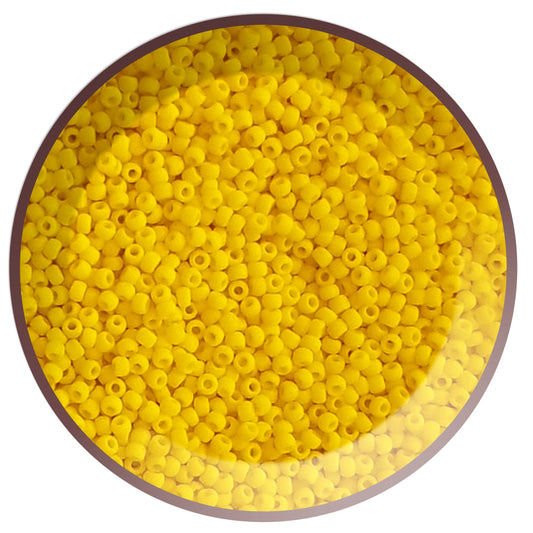 A pack of sunshine yellow, round opaque frosted Toho seed beads 11/0 in a circle white background.