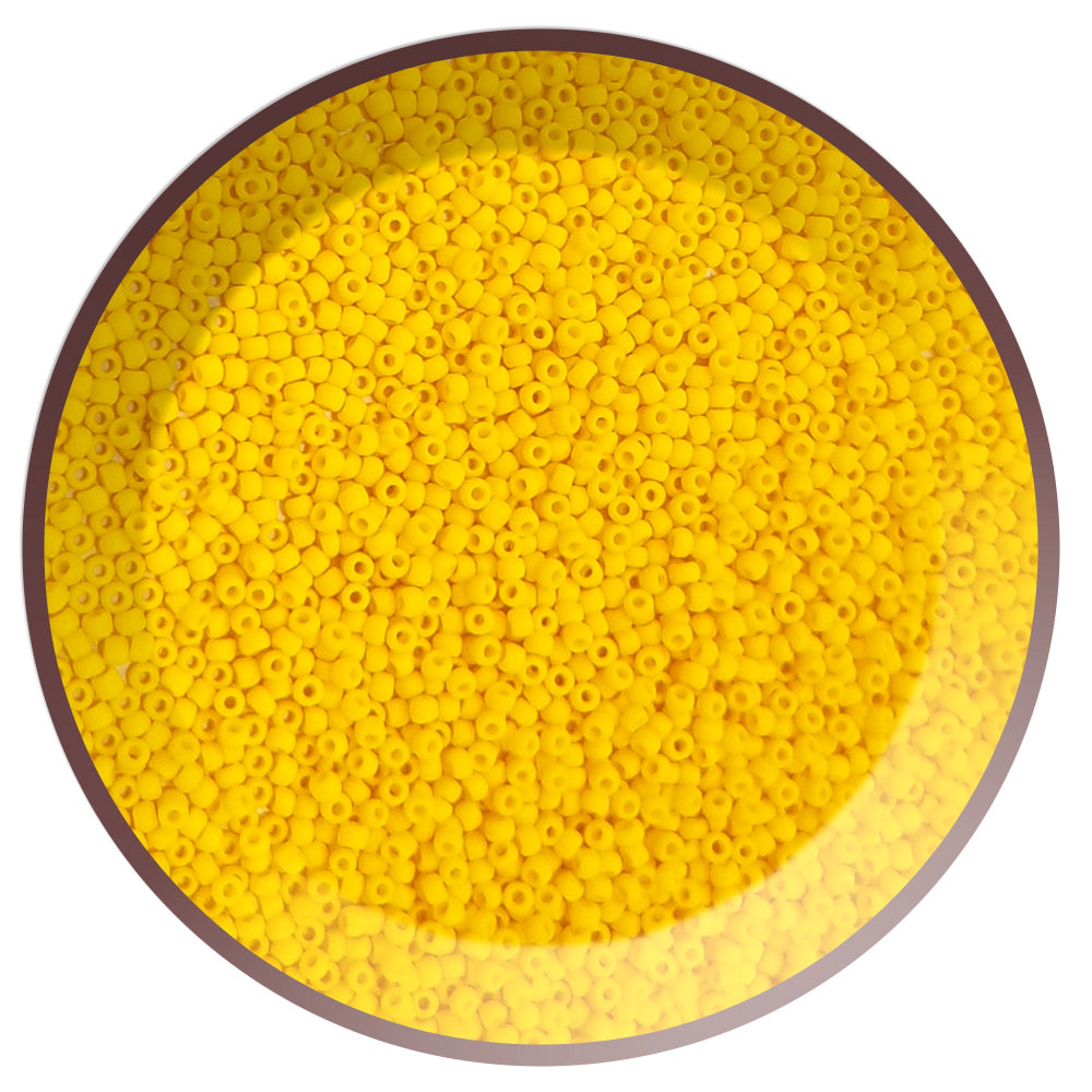 11/0 in sunshine yellow opaque frosted in a circle white background.