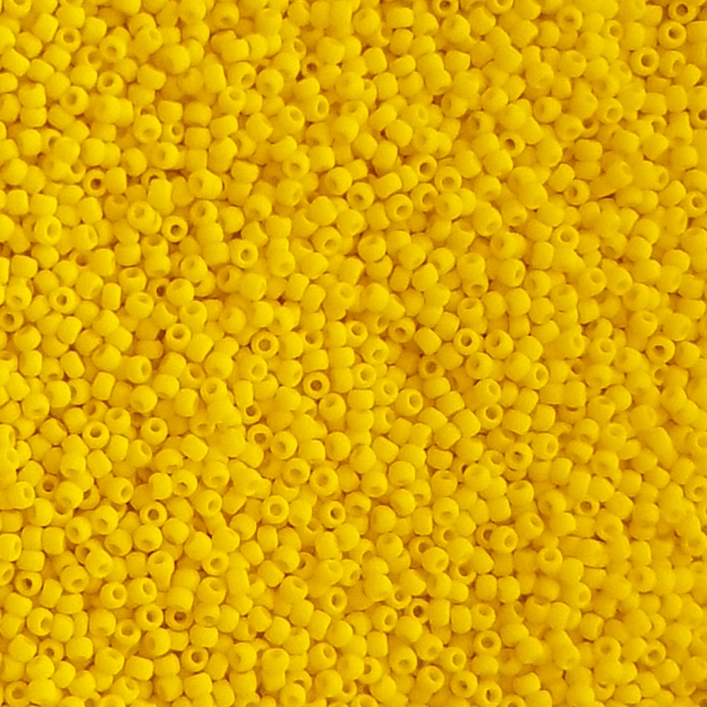 11/0 Toho seed beads in sunshine yellow opaque frosted close up.