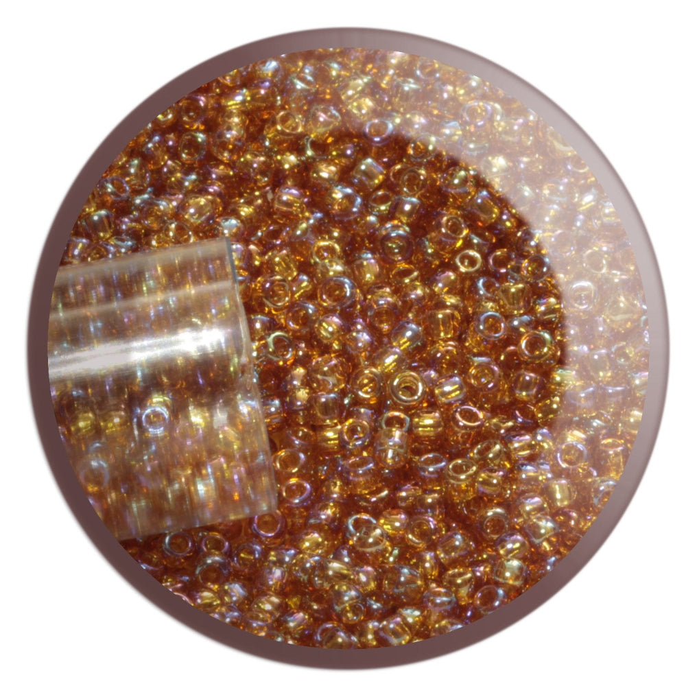 11/0 TR-162C Topaz Rainbow Round Toho Seed Beads in a circle white background.