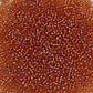 Close up of 11/0 Toho Seed Beads in Topaz Rainbow,