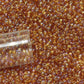11/0 TR-162C Topaz Rainbow Round Toho Seed Beads close up 